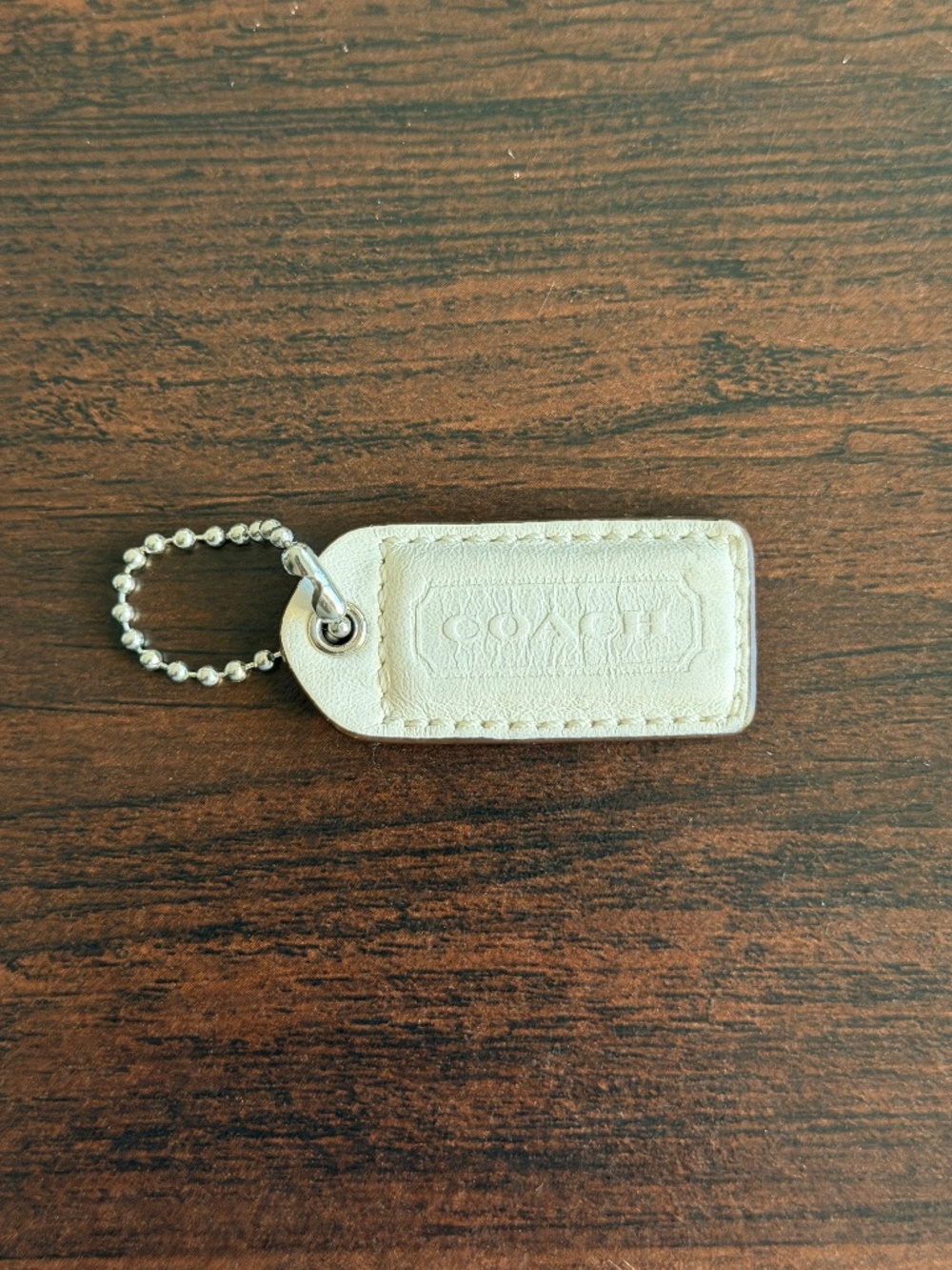 Coach white/cream leather hangtag